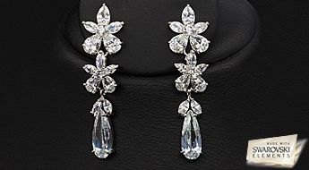 Классическая красота в уникальном исполнении. Позолоченныe сережки "Свадебный Цветок" с кристаллами Swarovski Elements™, просто созданы для романтичных леди!