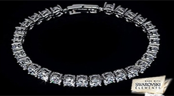 Очаровательный браслет "Юнона" с покрытием из 18-ти каратного белого золота и инкрустацией из прозрачных кристаллов Swarovski Elements™ со скидкой 50%!