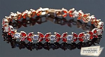 Īstām karalienēm! Skaista rokassprādze „Karalisks Ziediņš II”  ar romantisku dizainu ziediņu veidā no Swarovski Elements™ kristāliem.