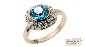 Стильное кольцо “Очарование” с красивыми формами и кристаллами Swarovski Elements насыщенного оттенка.