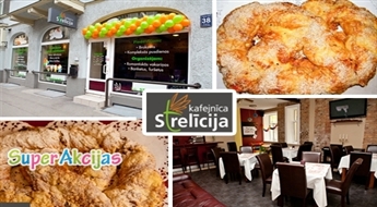 Кафе Strelīcija предлагает - Большой сладкий или соленый крендель с 41% скидкой!