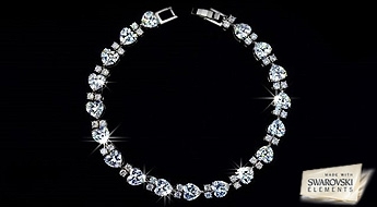 Очень романтичный браслет "Кристальные Сердечки" из прозрачных кристаллов Swarovski Elements™ в виде сердечек, порадует Вас своим ярким блеском!