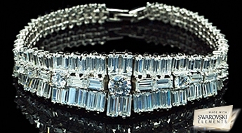 Шикарное великолепие! Ювелирный позолоченный браслет "Риа" с модным дизайном и ярким блеск множества прозрачных кристаллов Swarovski Elements™.
