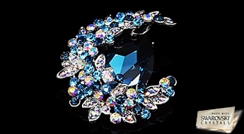 Восхитительный блеск! Шикарная позолоченная брошь “Миртель” с яркими кристаллами Swarovski™ синего цвета.