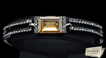 Уникальный позолоченный браслет “Золотая Магия” с кристаллами Swarovski™ золотого цвета.