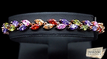 Красивый браслет “Селена” с золотым покрытием и разноцветными кристаллами Swarovski™.