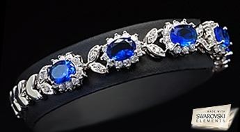 Grezna apzeltīta rokassprādze "Luksors" ar retu dizainu no ziliem Swarovski Elements™ kristāliem.