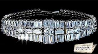 Шикарное великолепие! Ювелирный позолоченный браслет "Риа" с модным дизайном и ярким блеск множества прозрачных кристаллов Swarovski Elements™.