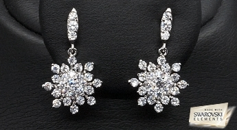 Сережки "Снежинки" из новой коллекции, с красивыми прозрачными кристаллами Swarovski™ и позолотой из белого золота!