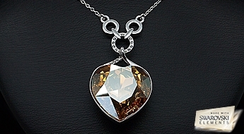 Великолепный позолоченный кулон “Сердце Осени” ограниченного тиража с кристаллом Swarovski Elements™ в виде сердца.