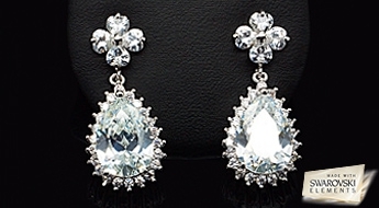Дизайнерские сережки "Кристальный Клевер" с кристаллами Swarovski Elements™, выполненные в классическом дизайне.