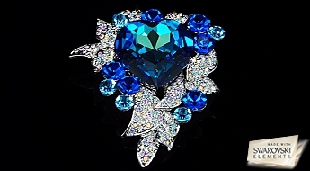 Невероятно шикарная, позолоченная брошь “Атлас” с оригинальными кристаллами Swarovski Elements™ синего цвета.