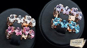 Красивое позолоченное кольцо “Виктория” с яркими кристаллами Swarovski™ в форме цветка.