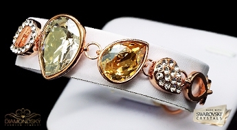 Яркий позолоченный браслет "Медовые Слёзы II" выполненный с использованием кристаллов Swarovski™.