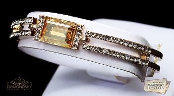 Уникальный позолоченный браслет “Золотая Магия” с кристаллами Swarovski™ золотого цвета.