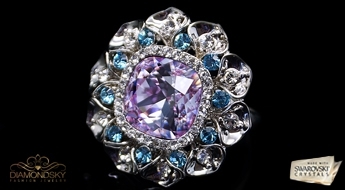 Позолоченное кольцо “Жасмин” с кристаллами Swarovski™ в оправе из Австрийских фианитов.