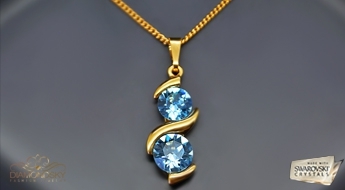 Великолепный позолоченный кулон “Млечный Путь (Aquamarine Blue)” украшенный кристаллами Swarovski™ со скидкой 50%!