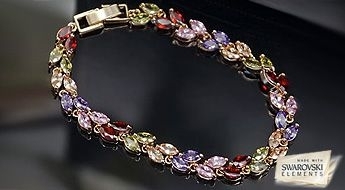 Красивый браслет “Селена” с золотым покрытием и разноцветными кристаллами Swarovski Elements™.