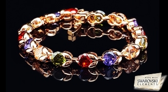 Яркий позолоченный браслет “Скарабей” с разноцветными кристаллами Swarovski Elements™ в красивой оправе.