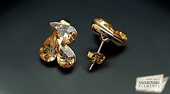 Ангельски красивые позолоченные серьги “Анжелика” с кристаллами Swarovski Elements™ медового цвета.