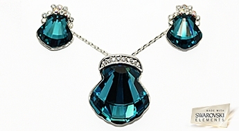 Сверкающий позолоченный комплект “Кристалина II” с красивыми кристаллами Swarovski Elements™ тёмно-синего цвета.